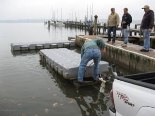 Loading section onto trailer